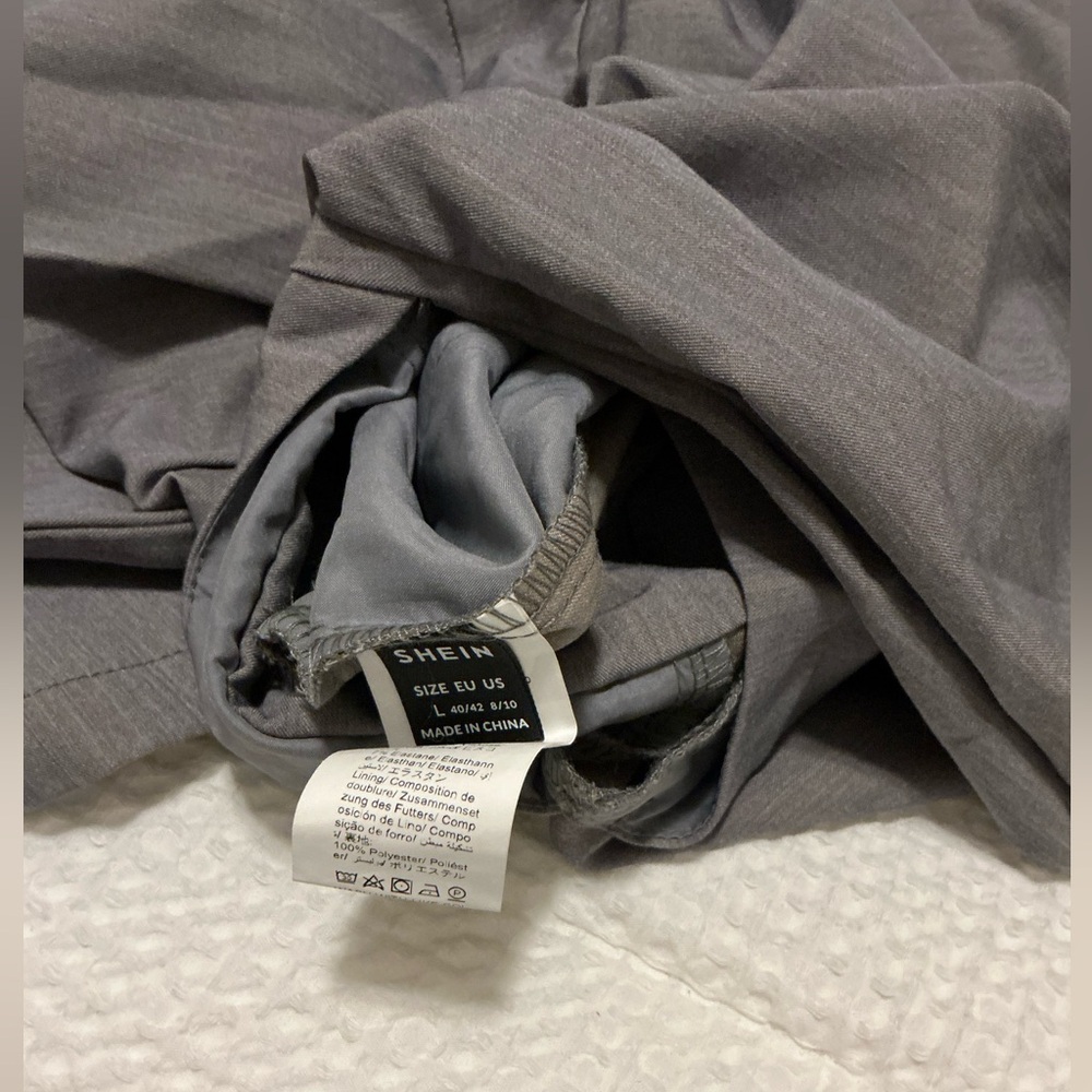 NWOT Gray Romper with Side Cut Outs - Picture 9 of 9